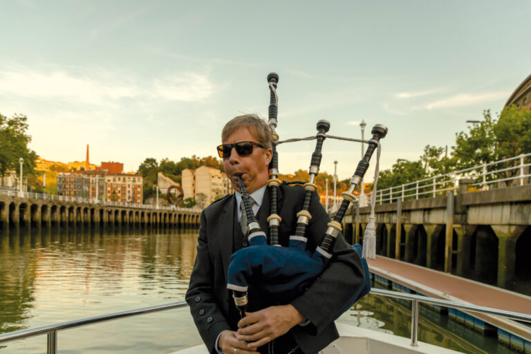 Piper John Stewart, Laphroaig Whisky Boat