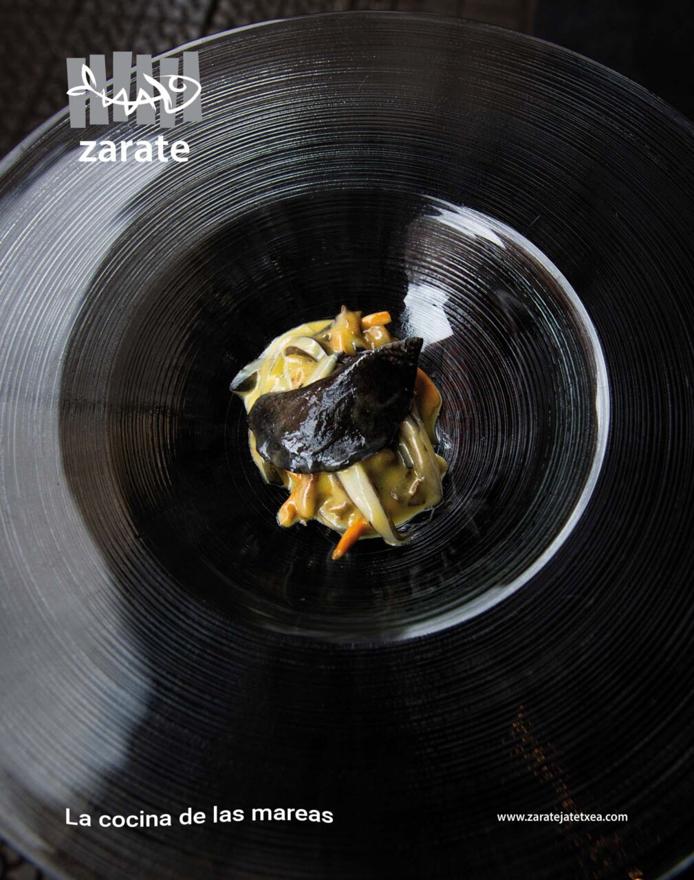 Plato gourmet del restaurante Zarate en Bilbao con ingredientes frescos del mar